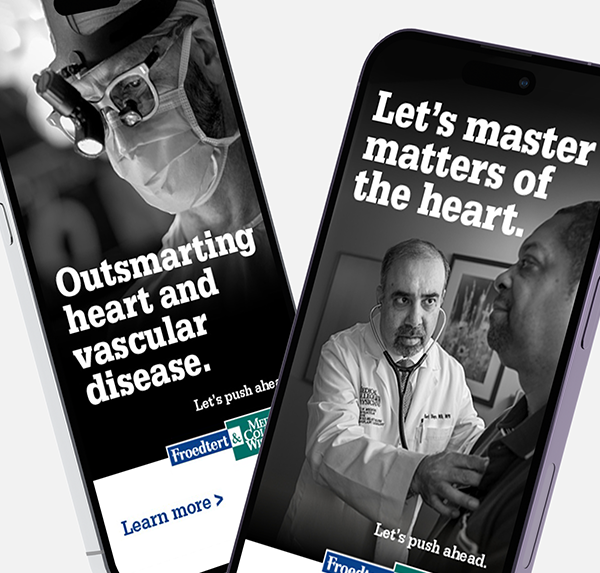 Two angled mobile phone screens show the digital ads developed for Froedtert Health by Unlock Health