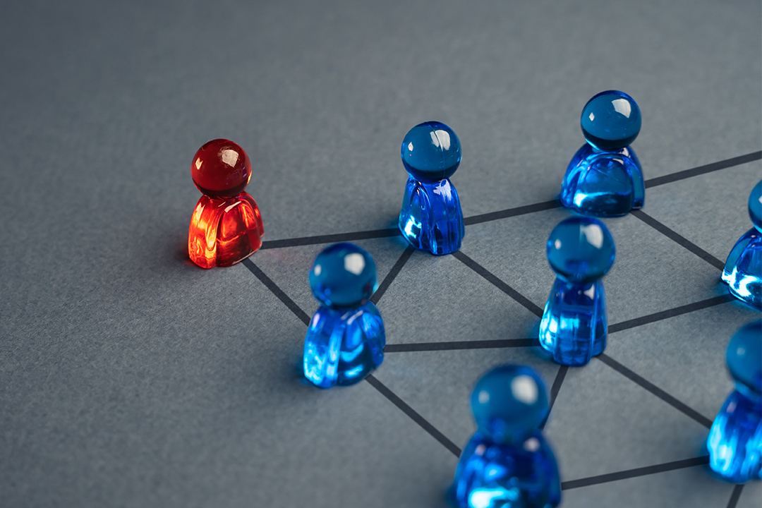 Image for red and blue figurines displaying leadership, connection, and teamworkteaser