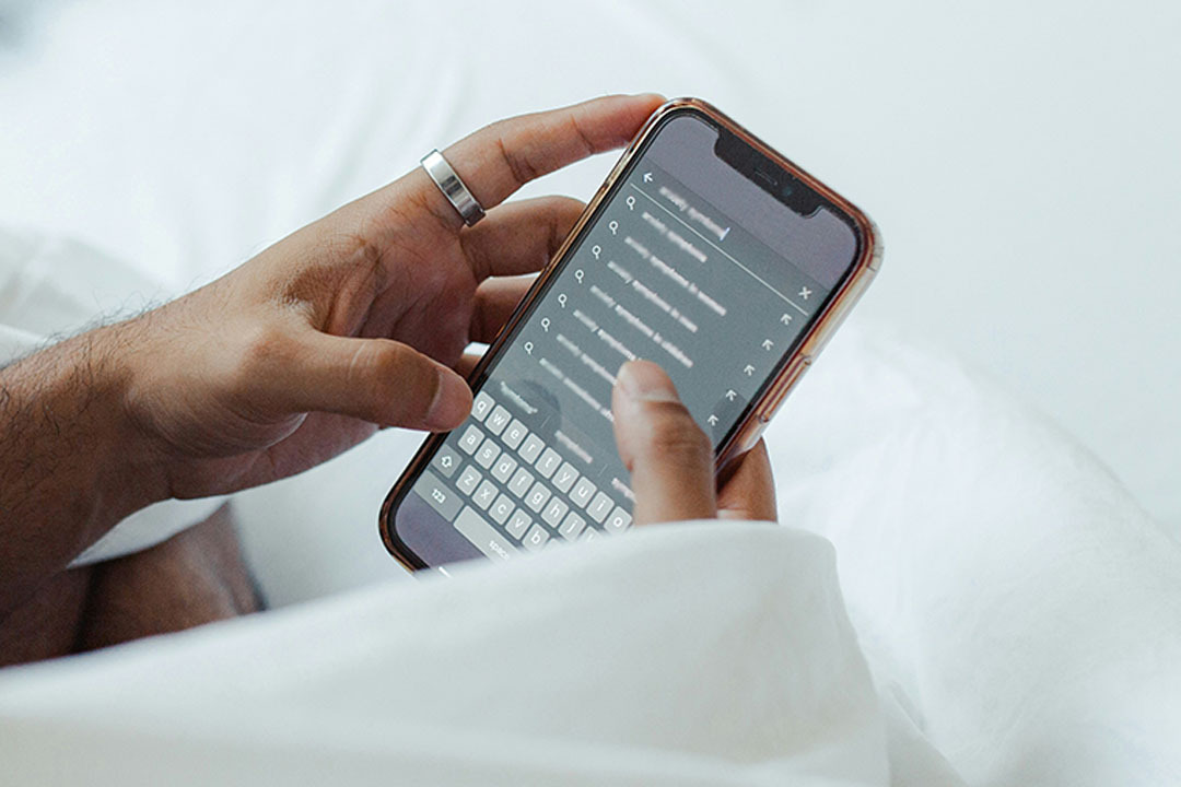 Image for Man using a phone to search online, highlighting how SEM strategy remains vital for healthcare marketers adapting to AI.teaser